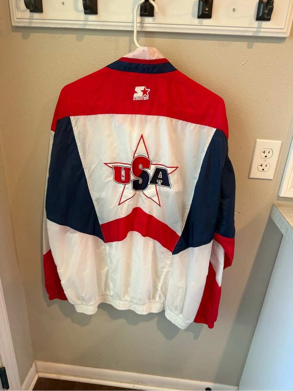 Vintage STARTER Atlanta 1996 Olympic Games White, Red & Navy Men’s windbreaker.